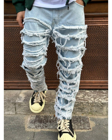 Jeans blu chiaro con rotture artdv q1-0.jpeg