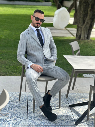 abito monopetto sartoriale grigio ghiaccio gessato riga larga art gioello-0.jpeg