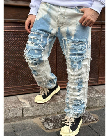 jeans blu chiaro con rotture sfumato bianco d834 q1-0.jpeg