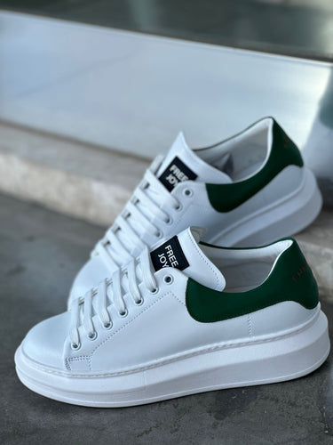 sneakers sportive bianche con riporto verde