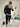 abito monopetto nero giacca cropped con pantalone fondo largo