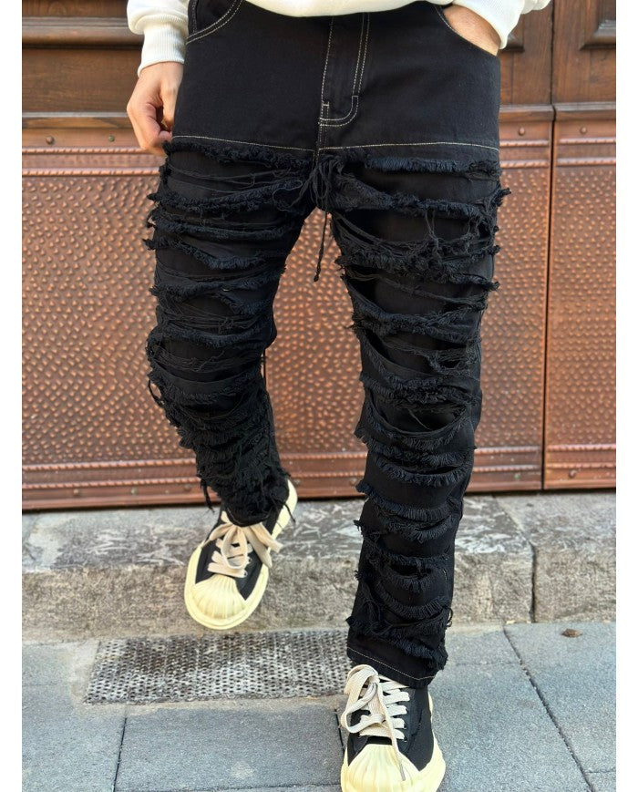 jeans  nero con rotture art ripped