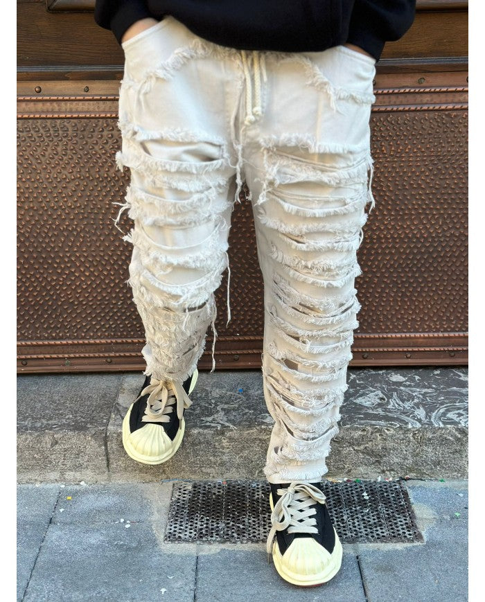 Jeans ripped beige  con molla fondo largo q1